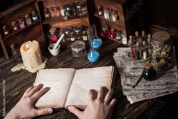 Fototapeta alchemist table with various poisons