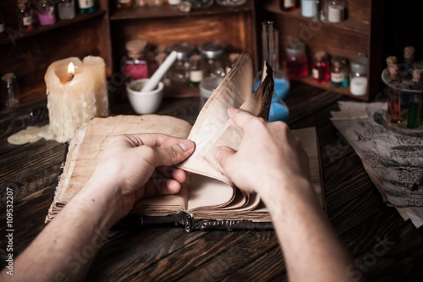 Fototapeta alchemist table with various poisons