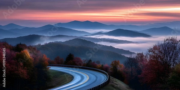 Obraz Blue Ridge Parkway in North Carolina with a damp road and early morning fog. high quality image