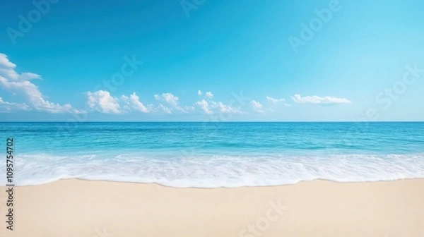 Fototapeta A beautiful blue ocean with a white sandy beach