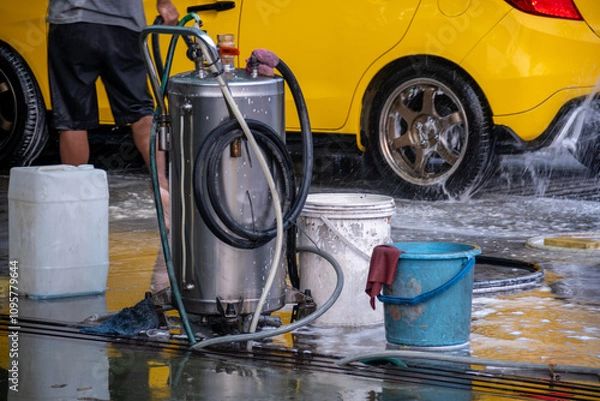 Fototapeta Car Wash Foam Tank Operated By Air Compressor. High Quality Shampoo Foam Generator