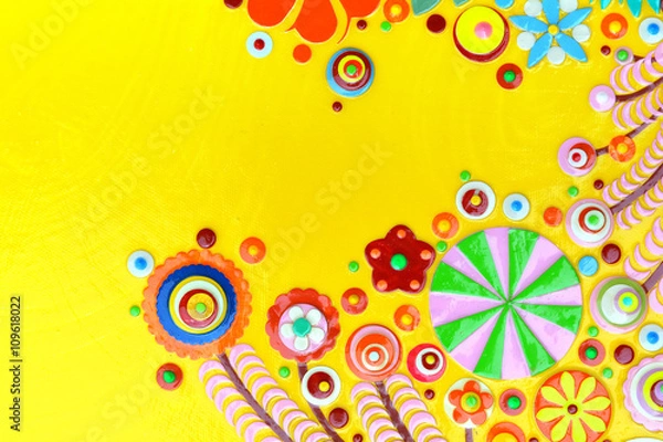 Fototapeta Flowers on yellow abstract surface, card or print poster composition made of paint layers, quelling with die cut and scissors, abstract background painting. 3d embossing and carving.