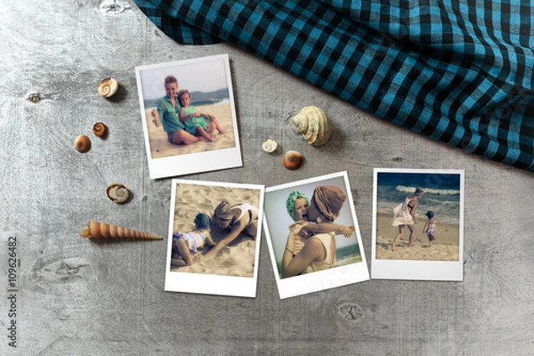 Fototapeta Beautiful seaside snapshots arranged on rustic wooden background with seashells around