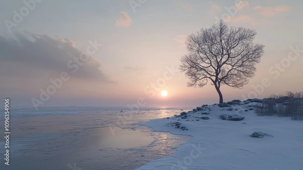 Fototapeta Serene Winter Landscape with Lone Tree at Icy Beach During Sunset, Capturing Minimalist Beauty of Nature in a Snowy Scene
