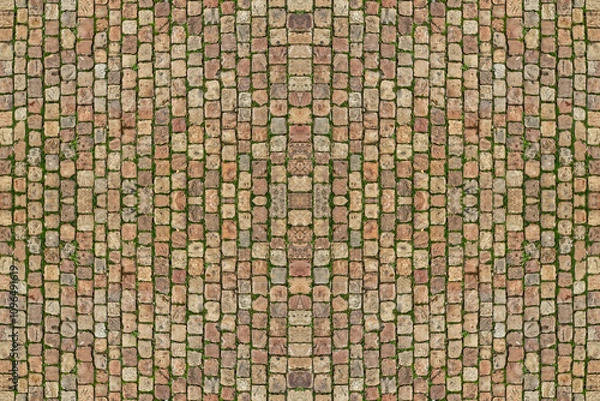 Obraz Walkway of stone bricks. Closeup view of a tile ewalk. The pavement consists of cubes of stone.