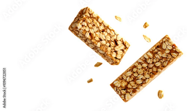 Fototapeta Nutty snack bars with crispy textures isolate on white background, cutout, png