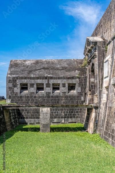 Fototapeta Panoramic view of caponier, citadel gate at Brimstone Hill Fort St Kitts and Nevis with cloudy blue sky
