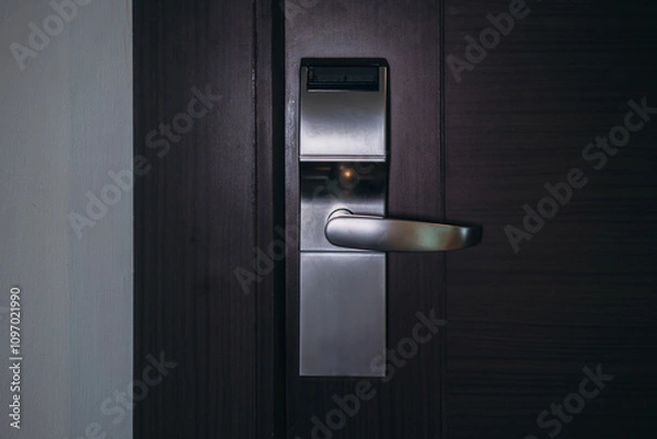Fototapeta Electronic card key for open door in hotel. Smart card key to lock and unlock door. Security systems and protection concept.