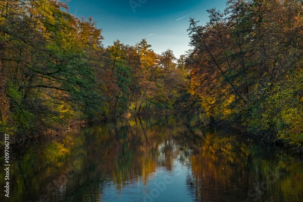 Fototapeta Chrudimka river in centre of Pardubice city in autumn evening