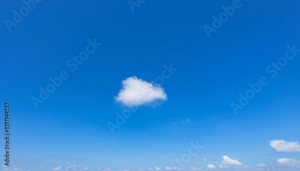 Fototapeta 파란 하늘에 떠있는 구름 한점
