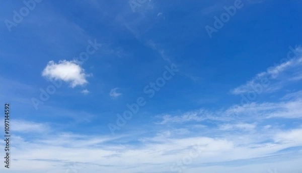 Fototapeta 파란 하늘에 떠있는 구름 한점