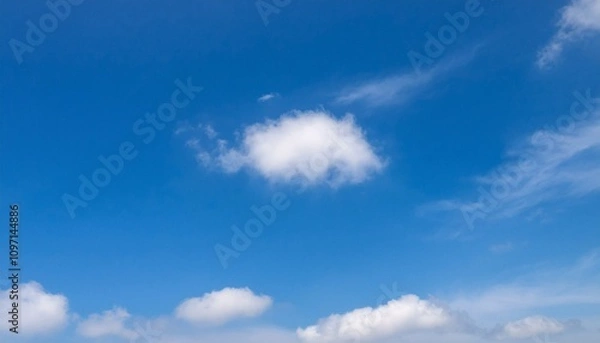 Fototapeta 파란 하늘에 떠있는 구름 한점