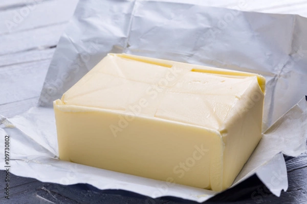 Obraz Butter in open packaging