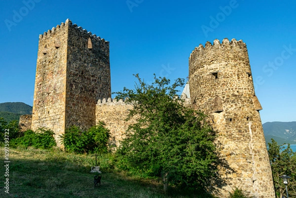 Fototapeta landscape with an ancient monastery building, historic old buildings of Georgia