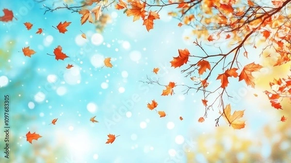 Fototapeta A vibrant autumn scene featuring falling orange leaves against a serene blue background.