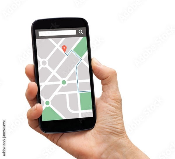 Fototapeta Hand holding smart phone with map gps navigation application on screen. Isolated on white background. All screen content is designed by me.