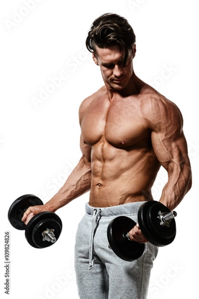 Obraz Muscular bodybuilder guy doing exercises with dumbbells