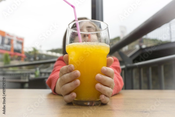 Obraz Children Drinking Orange Juice