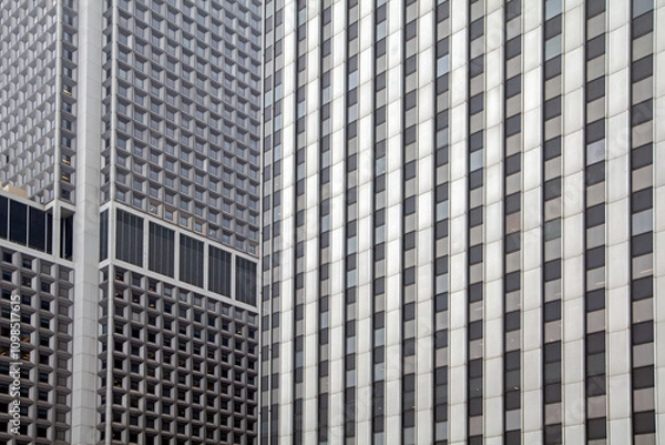 Fototapeta close up on the facade of a skyscraper in new york city
