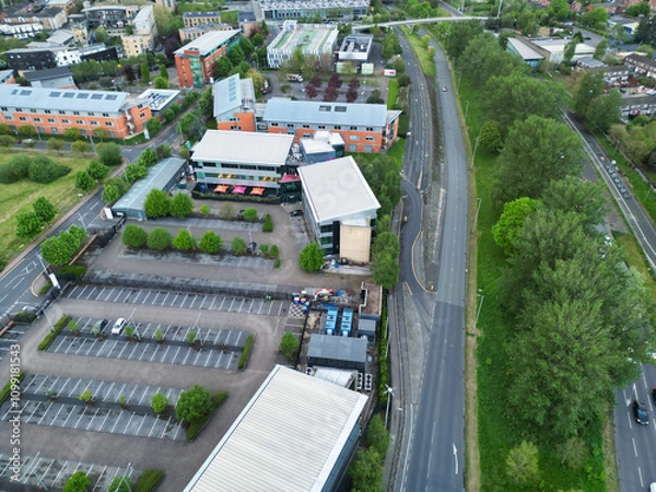 Fototapeta Aerial View of Buildings at Greater Manchester Central City, Northwest of England, United Kingdom. Aerial View Footage Was Captured with Drone's Camera on May 4th, 2024 During Sunset Time.