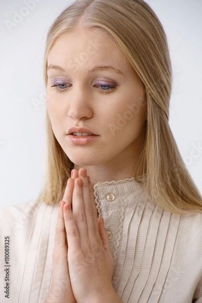 Fototapeta Young woman praying