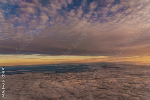 Fototapeta clouds and snow covered alp mountains from sky