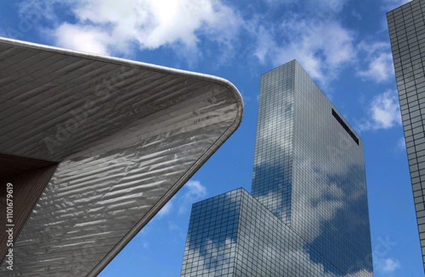 Fototapeta Modern architecture at the city of Rotterdam at the central train station, sky scrapers of the Delftse Poort