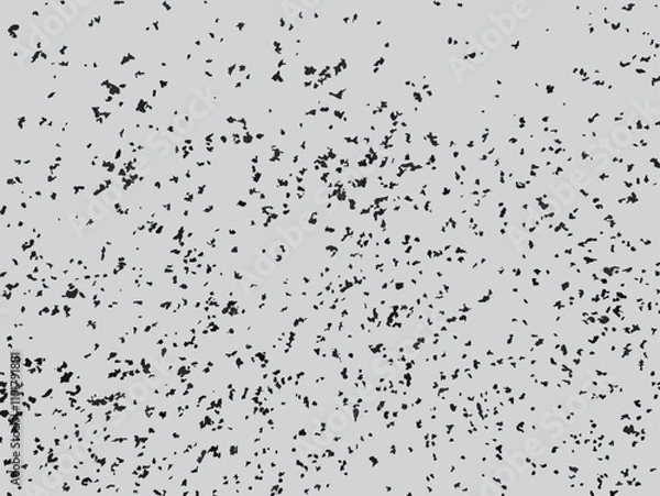 Fototapeta Scattered ash particle vector illustration. Monochrome grunge texture with random black specks on gray background. Mottled pattern with random spots