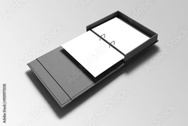 Obraz An open binder reveals a neatly secured A4 letterhead mockup, showcasing a polished design with a professional layout and metallic ring clips.