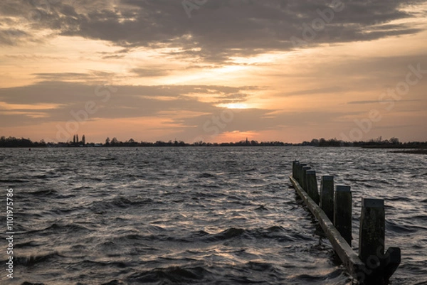 Obraz Sunset at Langweerder Wielen (Frisian: Langwarder Wielen), Frisian Lake in the Netherlands. View of the church tower of Langweer. 