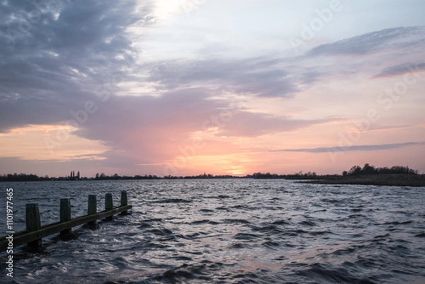 Obraz Sunset at Langweerder Wielen (Frisian: Langwarder Wielen), Frisian Lake in the Netherlands. View of the church tower of Langweer. 