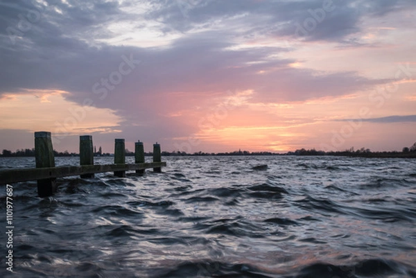 Obraz Sunset at Langweerder Wielen (Frisian: Langwarder Wielen), Frisian Lake in the Netherlands. View of the church tower of Langweer. 