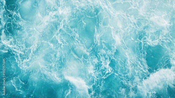 Fototapeta Calm turquoise ocean waves flowing gently under bright sunlight in a tropical paradise