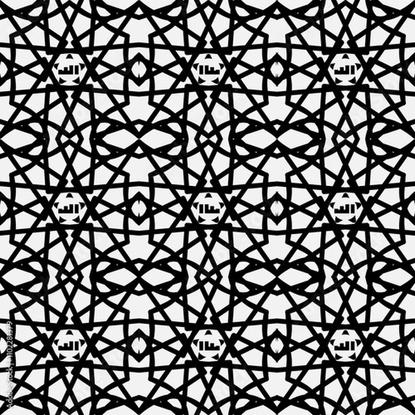 Fototapeta Intricate and detailed geometric pattern featuring interlocking star shapes and polygons, rendered in black on a white background. This pattern is inspired by traditional Islamic art.