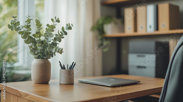 Fototapeta Bright and minimalistic workspace with greenery and modern accessories