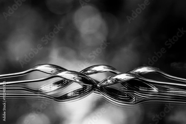 Obraz overlapping spoons reflected in mirror