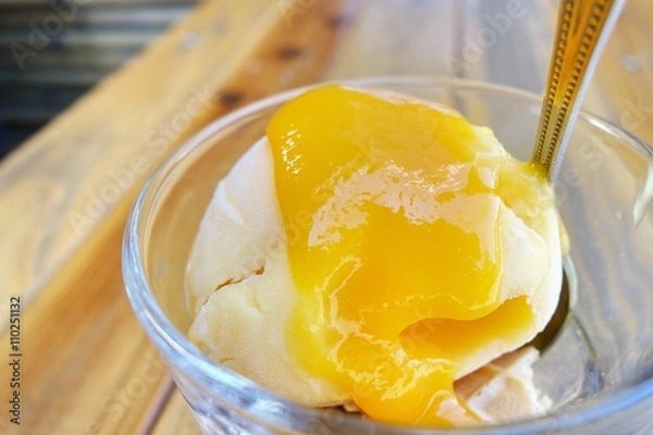 Obraz Mango ice cream with fresh mango sauce