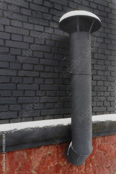 Fototapeta black ventilation pipe on black wall