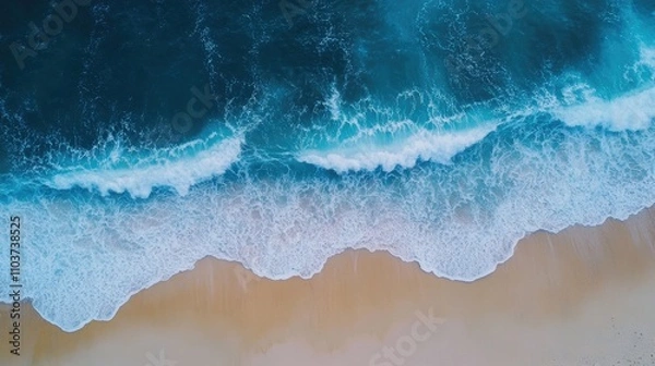 Fototapeta Tranquil beach waves create a serene atmosphere with gentle lapping water, perfect for capturing the essence of relaxation and tranquility. Ample copy space enhances the composition.