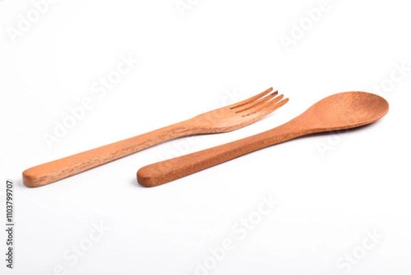 Fototapeta Wooden spoon and fork isolated on white background. A set of kitchen utensils