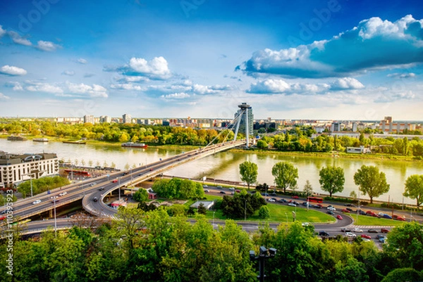 Fototapeta Bratislava cityscape view on the southern part of the city with modern bridge and Danube river from the castle hill. Bratislava is the capital of Slovakia