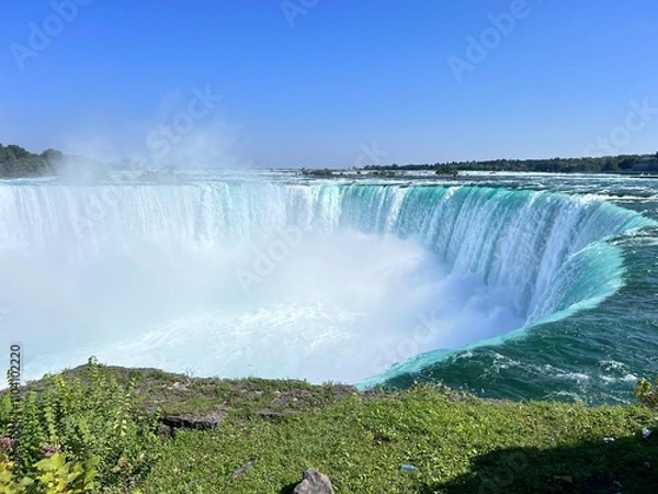Fototapeta Horseshoe Falls at Niagara Falls on a Sunny Day with Mist Rising