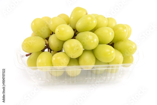 Fototapeta Shine muscat grape in plastic tray isolated on white background. Sweet green grape.