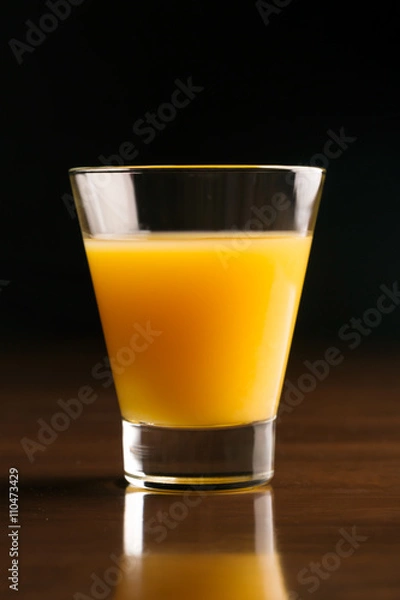 Obraz A glass of chilled orange juice