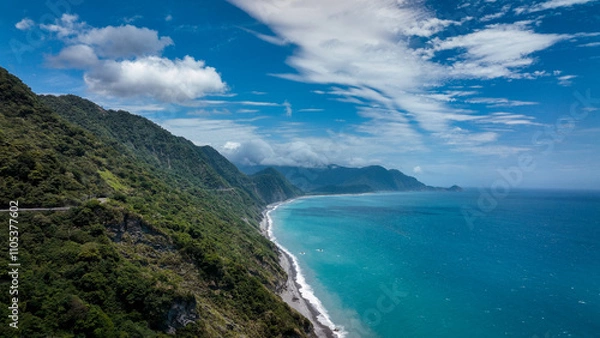 Fototapeta Stunning coastal view of Taiwan shoreline with lush mountains and a deep blue ocean