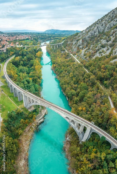 Fototapeta Aerial view of Solkan Bridge - the world's longest stone arch railroad bridge over the Soca River near Nova Gorica in western Slovenia.