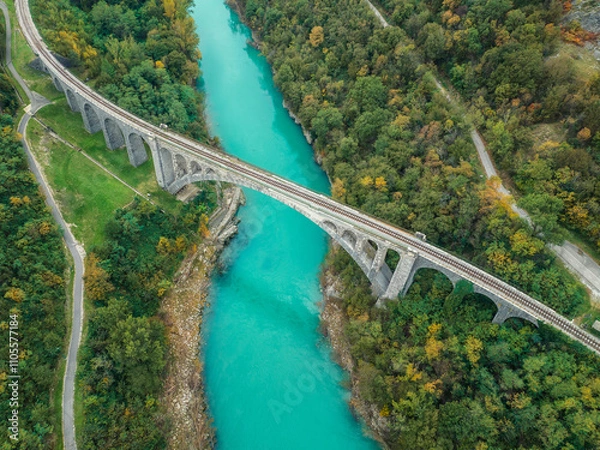 Fototapeta Aerial view of Solkan Bridge - the world's longest stone arch railroad bridge over the Soca River near Nova Gorica in western Slovenia.