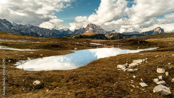 Fototapeta Serenity by the Pond: A Hidden Gem in the Dolomiti Mountains