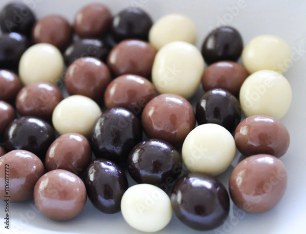 Fototapeta Mix of chocolate balls ,milk, dark and white chocolate
