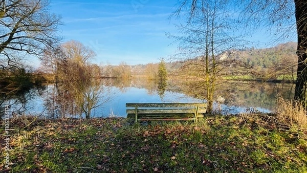 Obraz Eine Bank am See